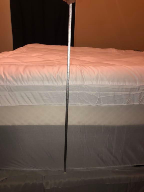 From bottom of mattress to top of cover (mattress+foam topper+cover) was 19 inches, and the topper still fit with plenty of room to spare.