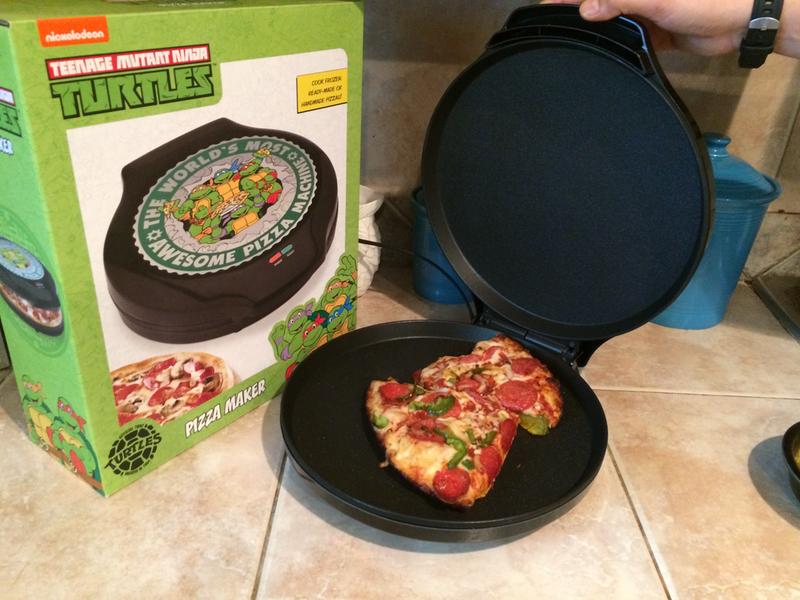 TMNT pizza maker in action with hot pizza!