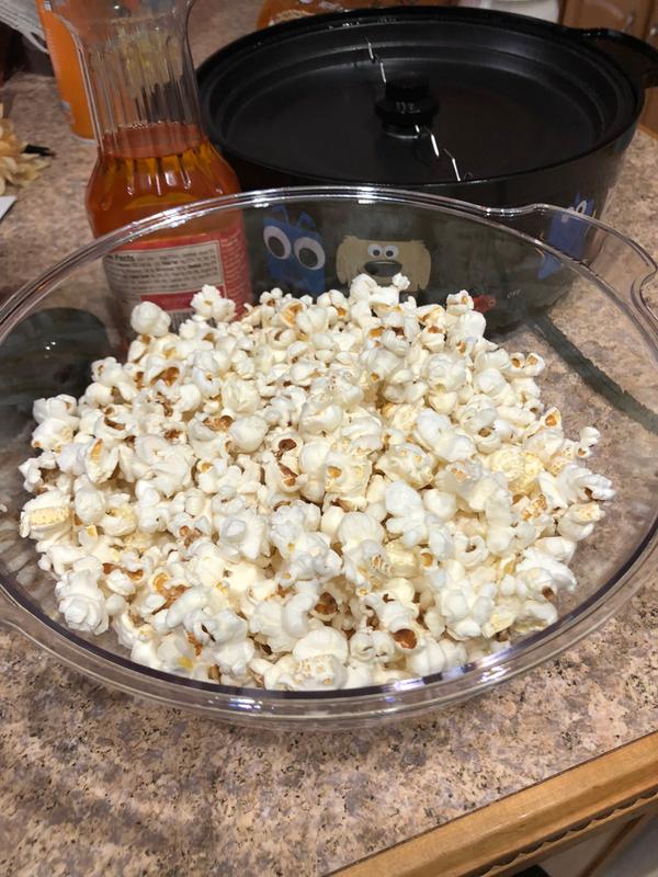 Popcorn is served in the lid/serving bowl!