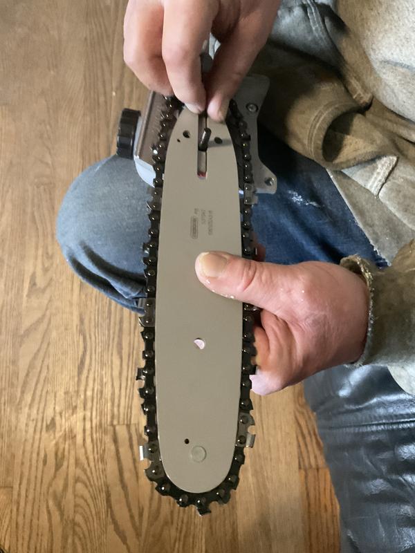 Follow instructions for properly tensioning the chain