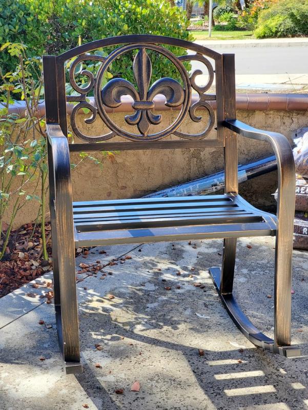 Wooden fleur de lis rocking online chair