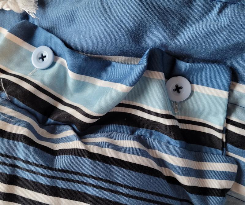 Pillow attaches with buttons