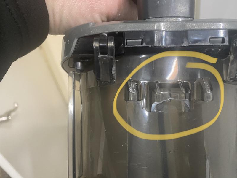 One of about 10+ dust cups that all break in the same spot. You can help to avoid this by pushing down on the button before snapping back into place on vacuum.  But will eventually break.