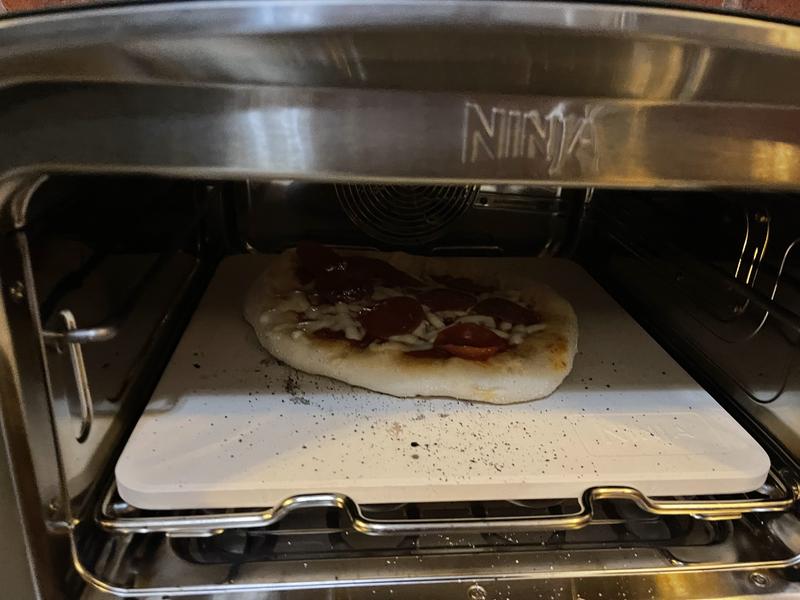 Ninja Woodfire Pizza Oven, 8-in-1 outdoor oven, 5 Pizza Settings, Ninja  Woodfire Technology, 700°F high heat, BBQ smoker, wood pellets, pizza  stone