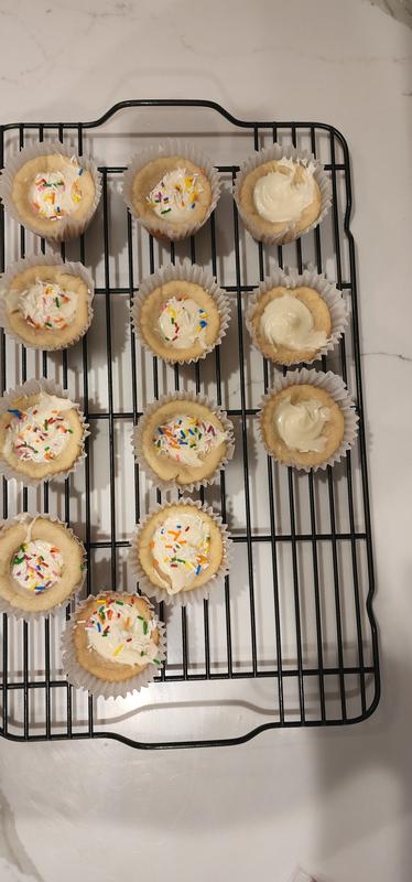 Perfect cupcakes on rack