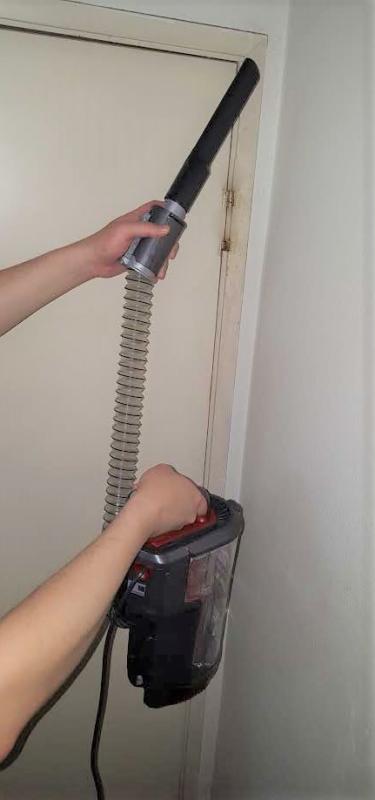 Using the Crevice Tool with the Lift-Away Pod to Clean the edges of doors and rooms