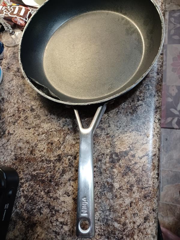 loose from edge of pan