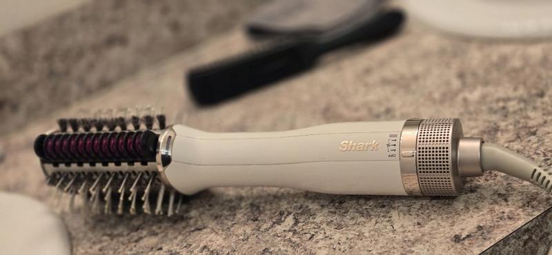 Customer photo for "The ease of styling and smoothing my wife's hair without excessive heat damage, leaving a professional finish at home."