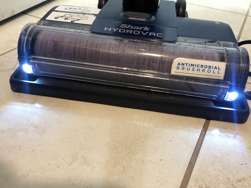 Self cleaning brush dock