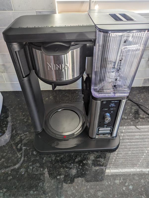 Water leaks from underneath base and constantly drips from top where it goes into coffee filter