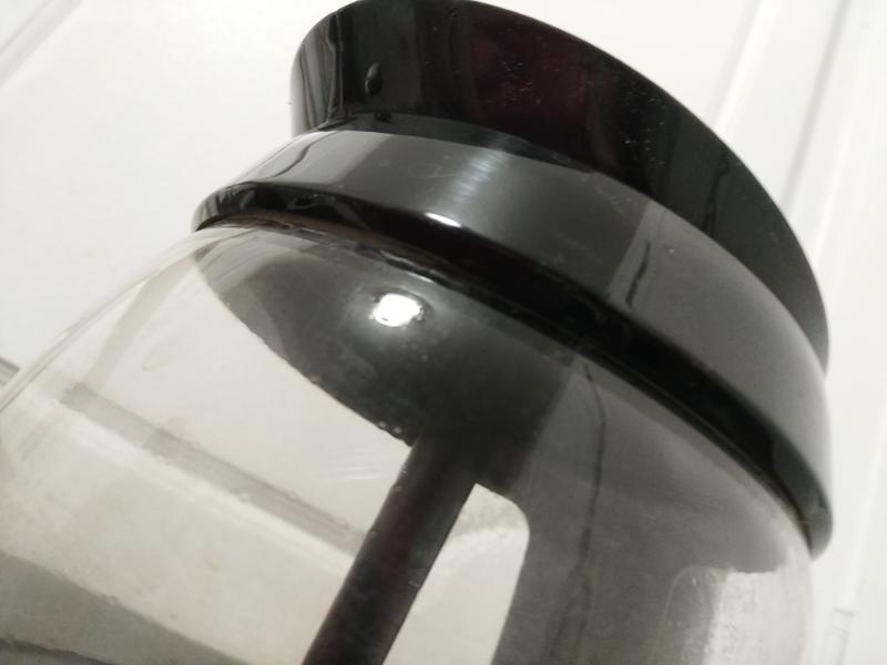 1/32 " gap between the plastic rim and glass surface under nose area