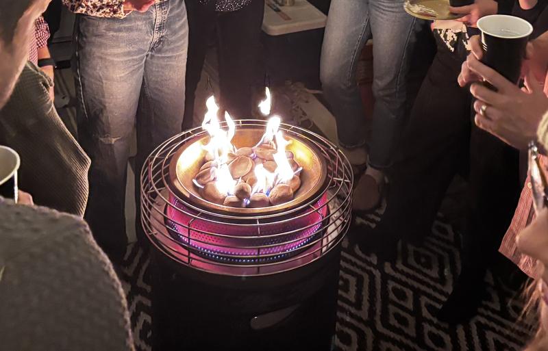 Standing around the Fireside360 in the winter