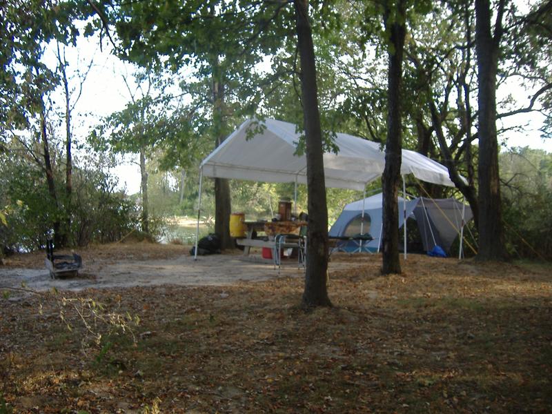 Shelter Logic canopy as my dining fly in my primative campsite on the lake.