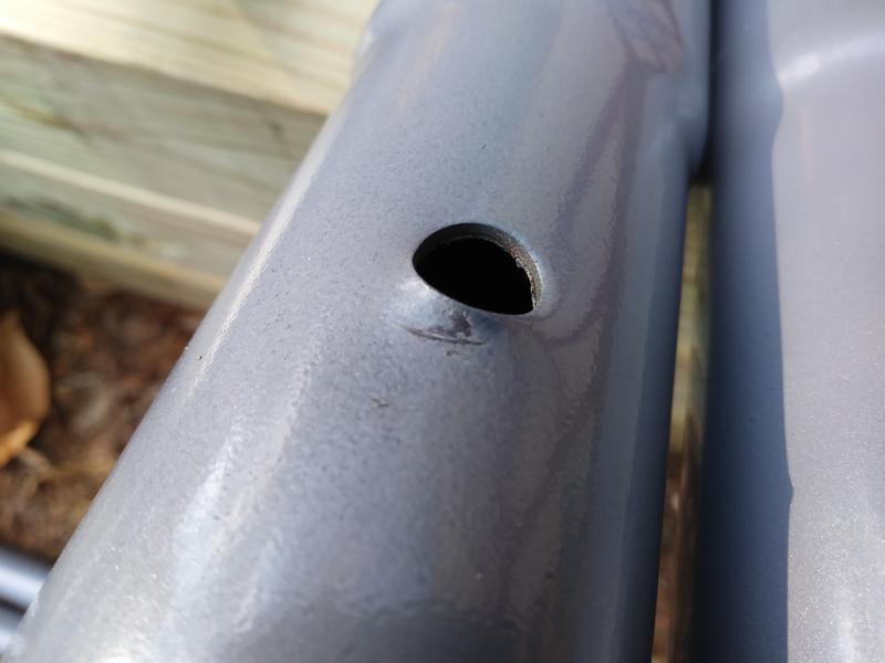 A more clear photo of typical dimpeling.   The scaped paint is where I tried to force this into another tube, and failed.