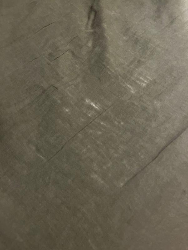 Customer photo for "Surprised that these sheets are worn out after four years."