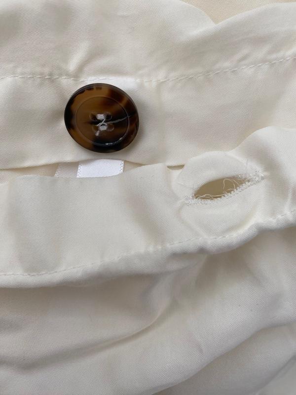 Customer photo for "Sloppy stitching"