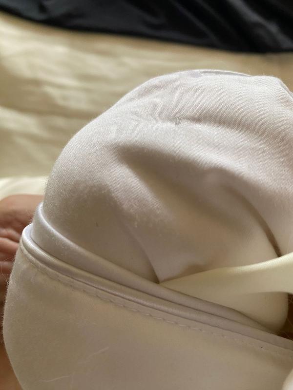 Customer photo for "Less than a week and it’s losing fill and Cotten is fuzzy"