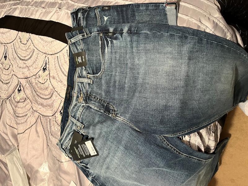 Jeans on the top shorts on the bottom both pair have a "34" inch waist