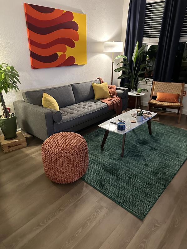 Orange woven pouf ottoman