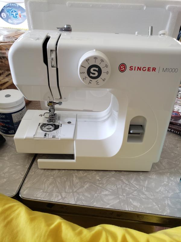 Ive been having troubles with my singer m1000. At first I realized my  bobbin wasn't catching and I could hear my needle scratching the inside so  I d how to fix the