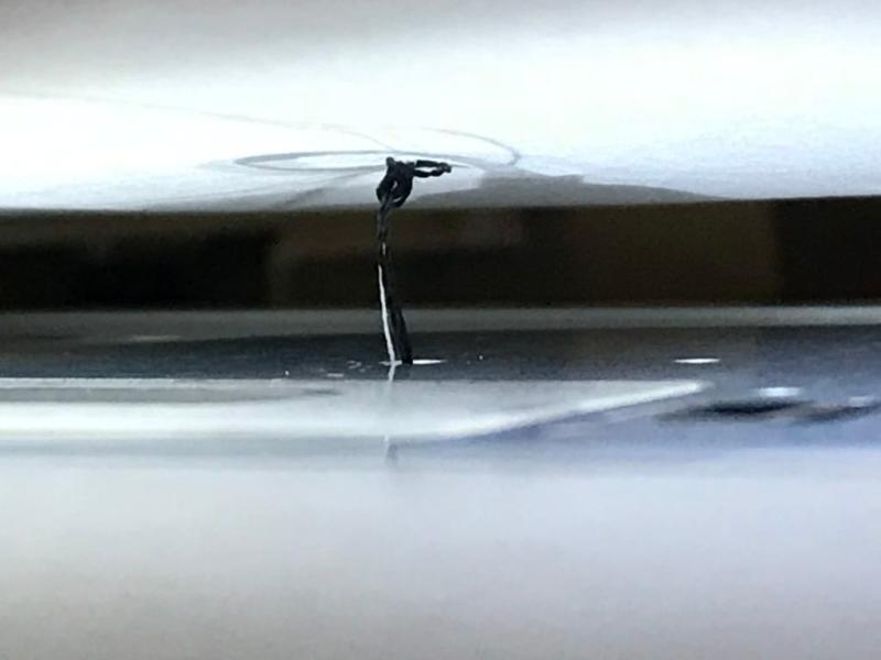 Thread stuck in bobbin area