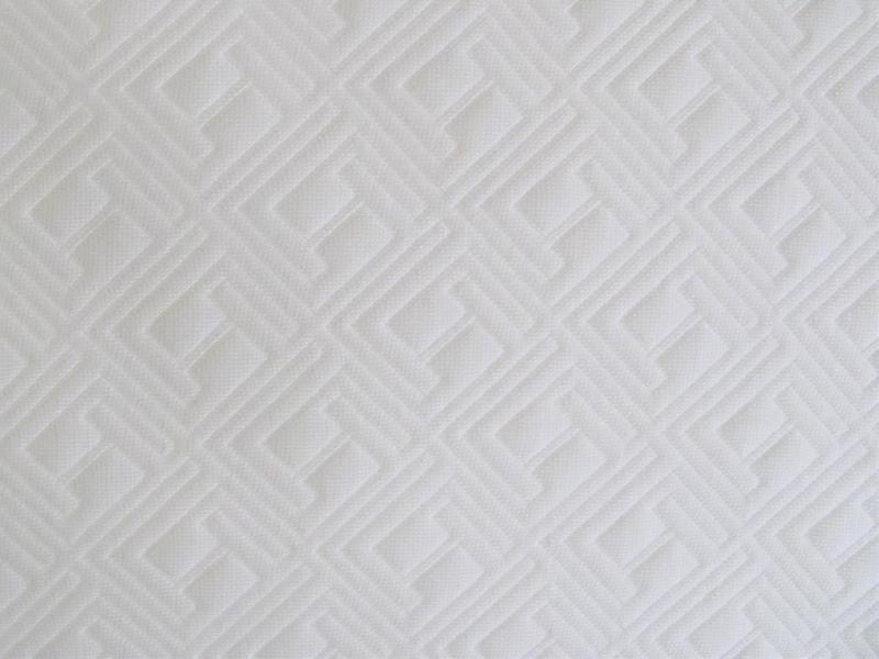 Very nice white quilted cover on the memory pillow that is extremely comfortable with or without a pillowcase and removes easily.