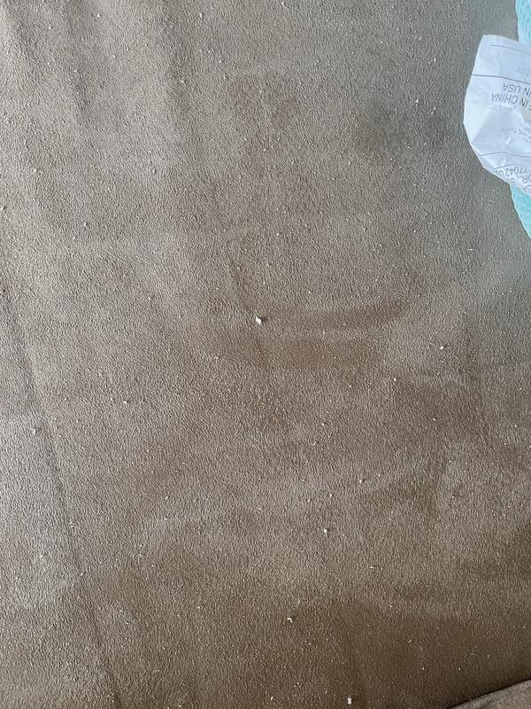 White residue from the mattress cover that was included.