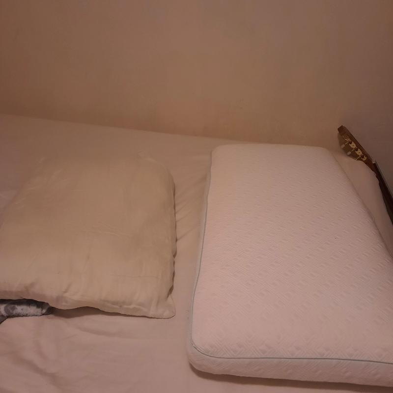 The size comparison from my standard pillow to the IntelliSLEEP  pillow