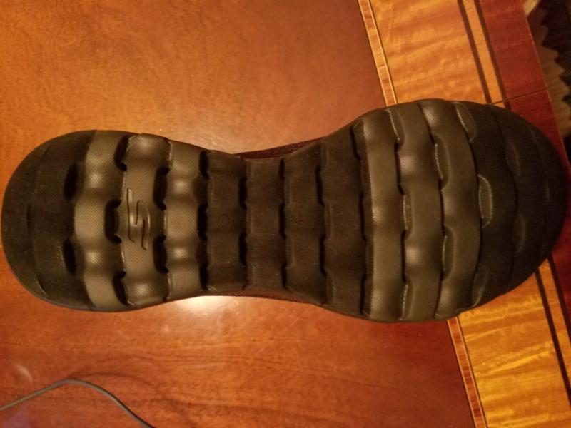 FELT that is slippery, collects dirt, gets wet on the soles (darker areas)