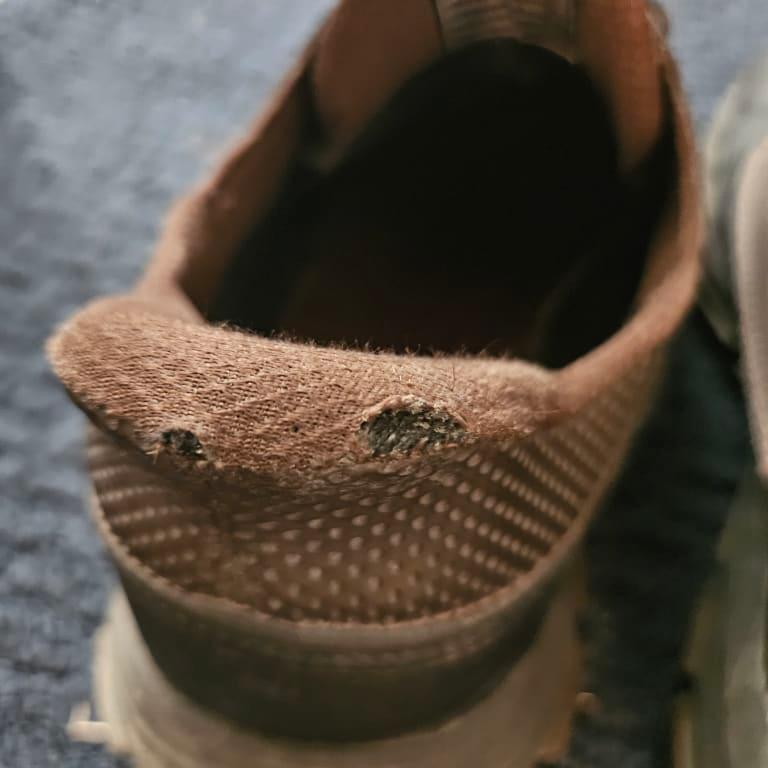 Beginnings of tears in left shoe