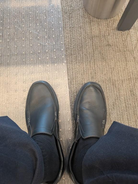 Right shoe texture and color does not match up.