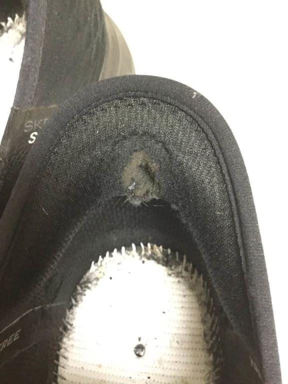 Hole on inside cup of heel.