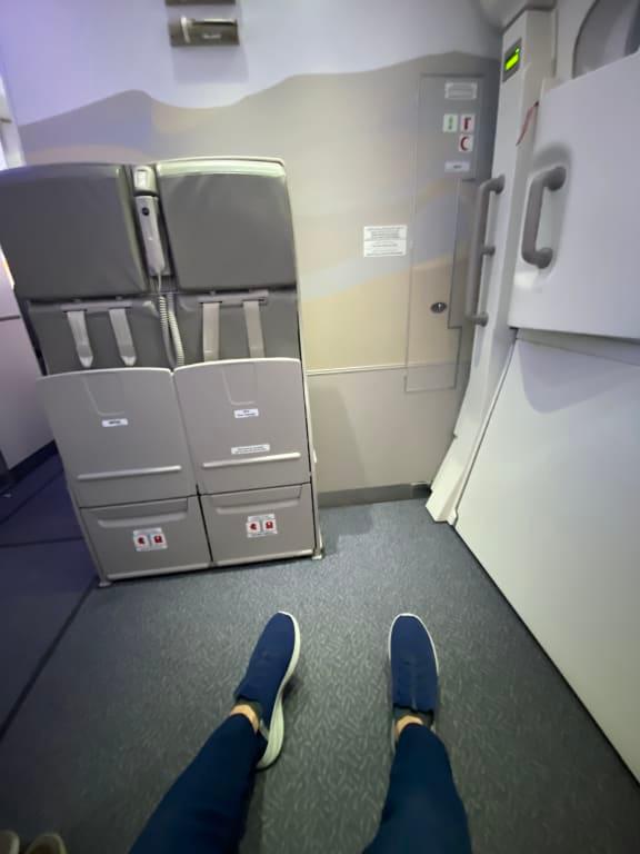 Comfy shoes and leg room on long flight. Nice to be able to slip on and off without bending down.