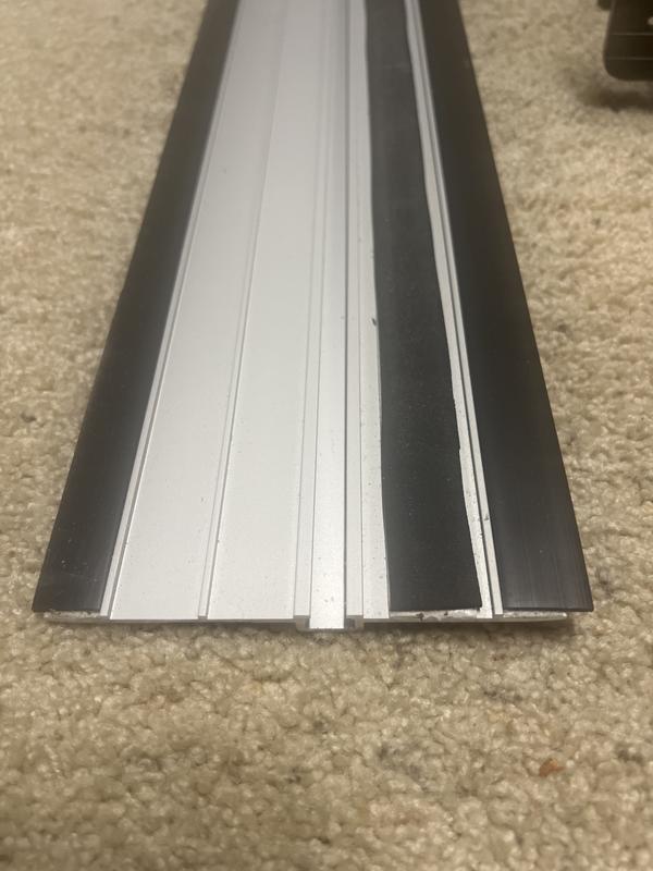 Track with anti slip tape added between two factory strips that were too slippery.