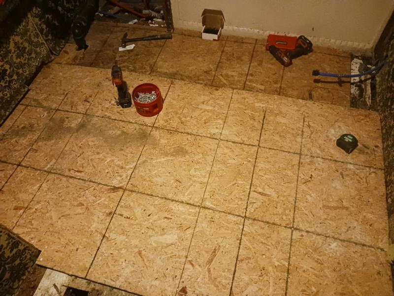 Bathroom Subfloor overlay. Screws set through 3/4 OSB, old leno, and 1/2 inch original plywood.
