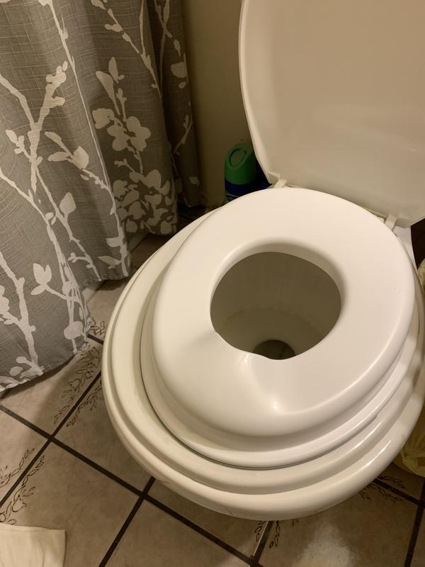 Seat reducer fits onto any toilet seat