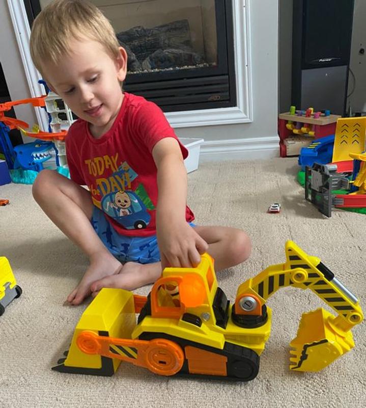 Little Boy Playing with Color Toys on Floor Stock Photo - Image of  bulldozer, little: 19039326