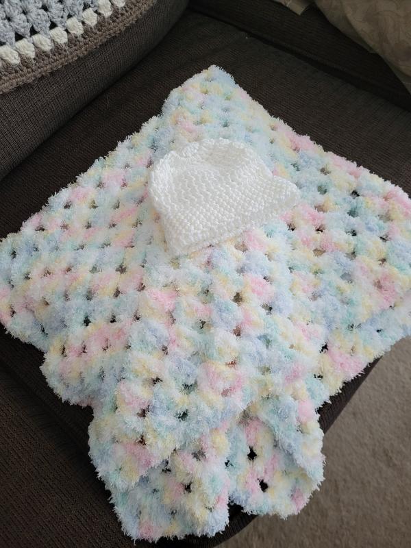 Blankies made with Bernat Pipsqueak yarn with an added feltie. Hand crochet  by Hat to Have…