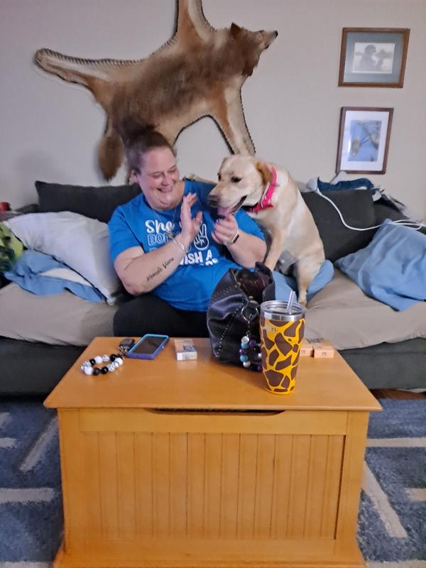 Playing with her human sister