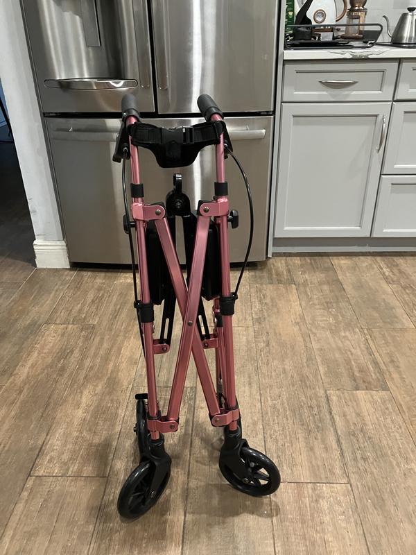 While seated I can easily fold and lift this walker!