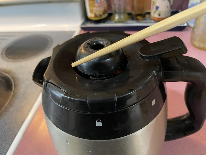 Pointing to the crack.