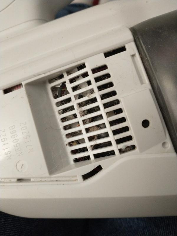 Photo of motor area, clogged exhaust vent