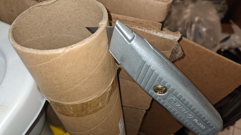Cuts thick cardboard shipping tube