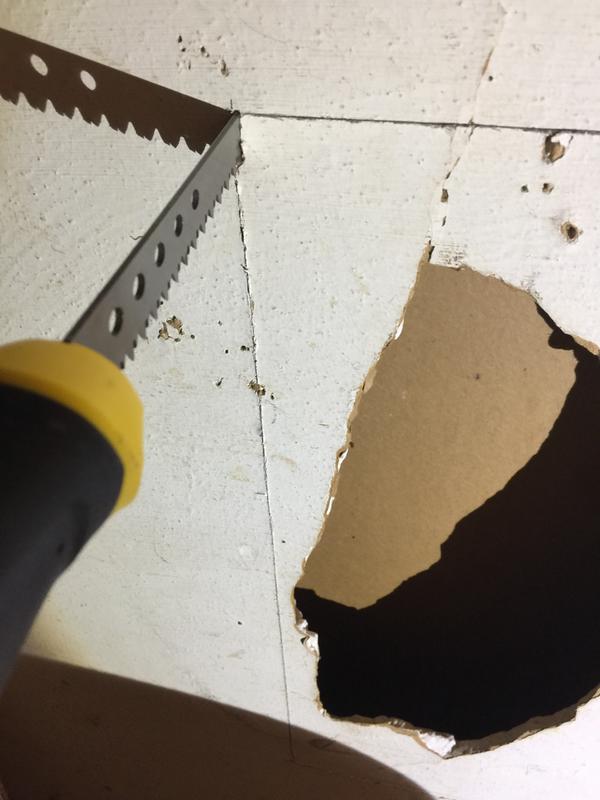 I decided to use the Stanley Jab Saw to cut out a damaged section of drywall. The pointed tip of the saw punched through the 1/2” thick drywall quite easily.