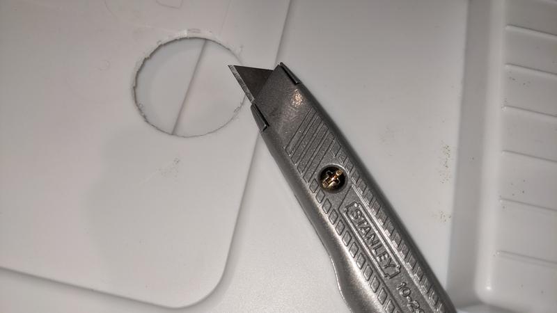 Cuts thick plastic container for hydroponics