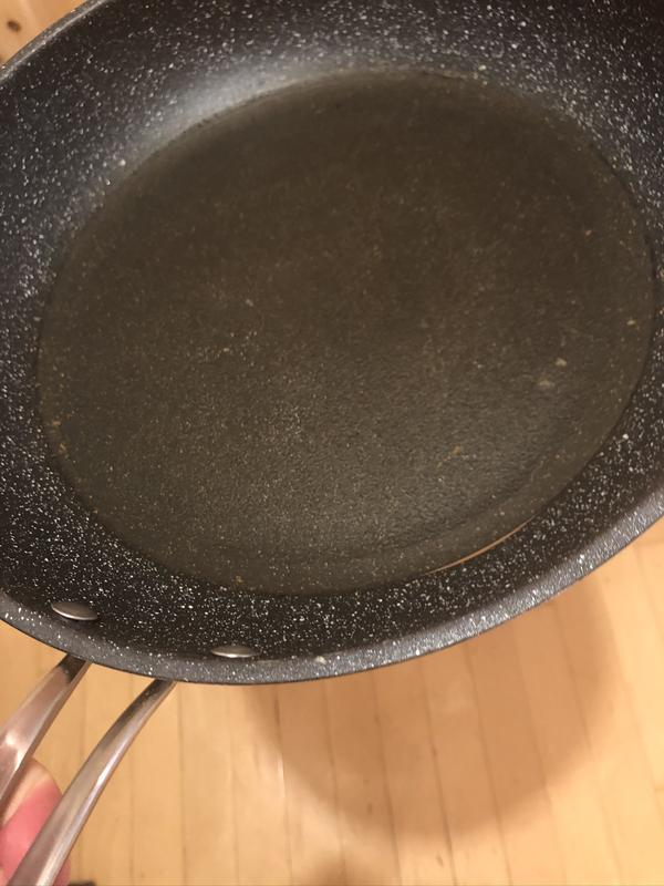 Original fry pan split between side and base to the lower left.