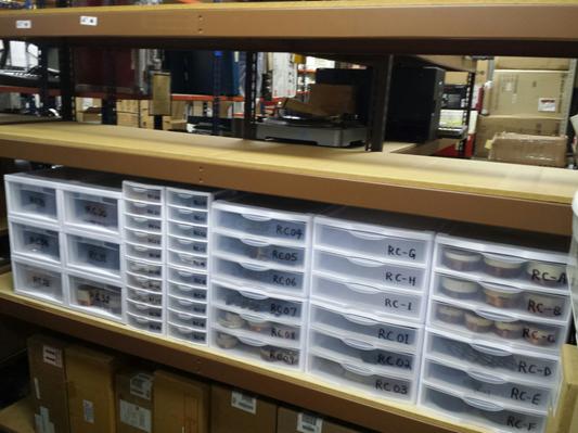Just one example of how we use Sterilite bins, in this case, for speaker recone parts, with bin locations that cross-reference to our database. Literally thousands of parts in there, and has been expanded since this photo was taken.