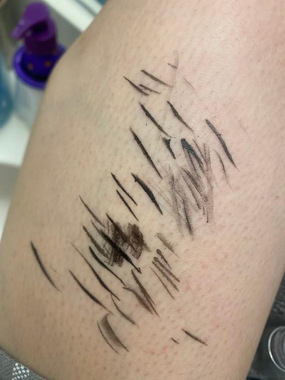 This is my attempt of getting the product out the darker lines are literally from dipping my liner in water out of frustration because it wouldn't come out.