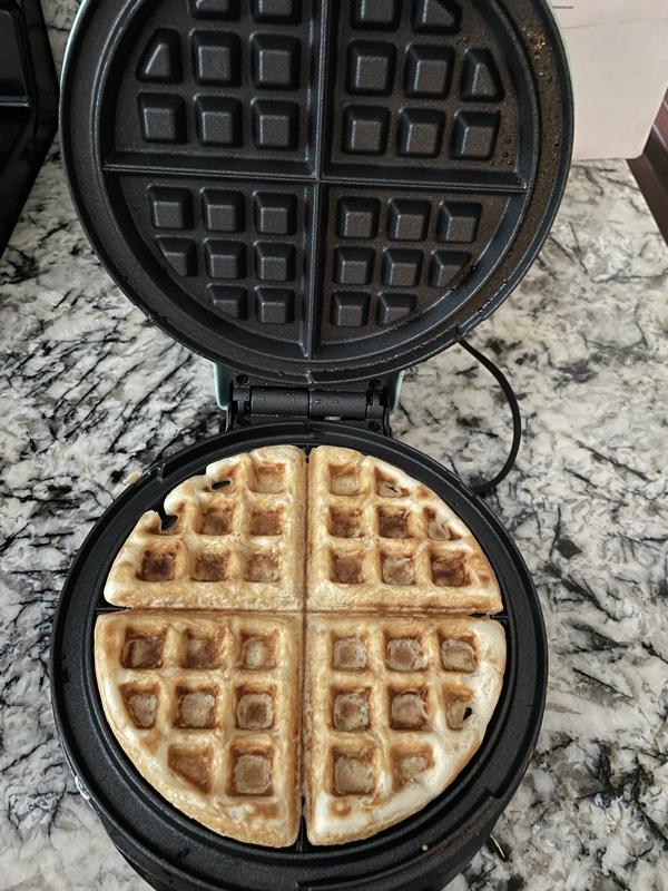 Waffle being cooked.