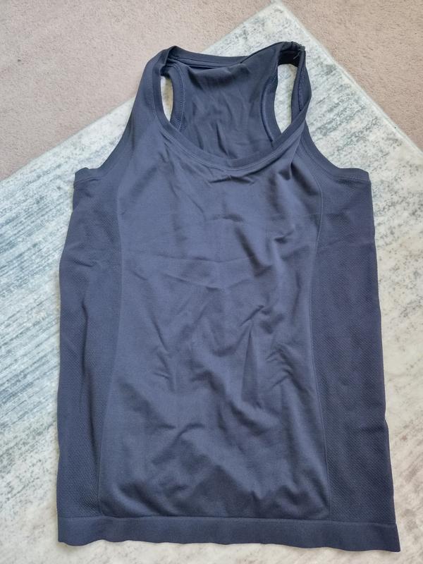 Customer photo for "Nice material but size down!"